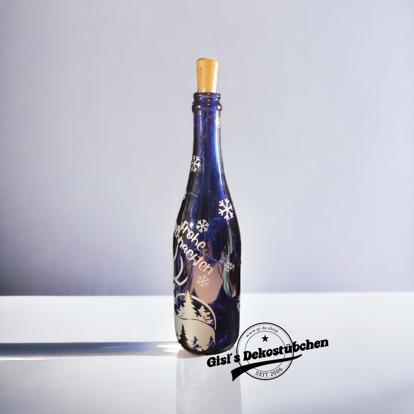 Frohe Weihnachten beleuchtete Flasche