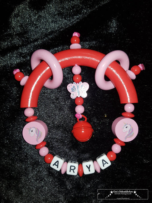 Greifring mit Namen Einhorn, Schmetterling