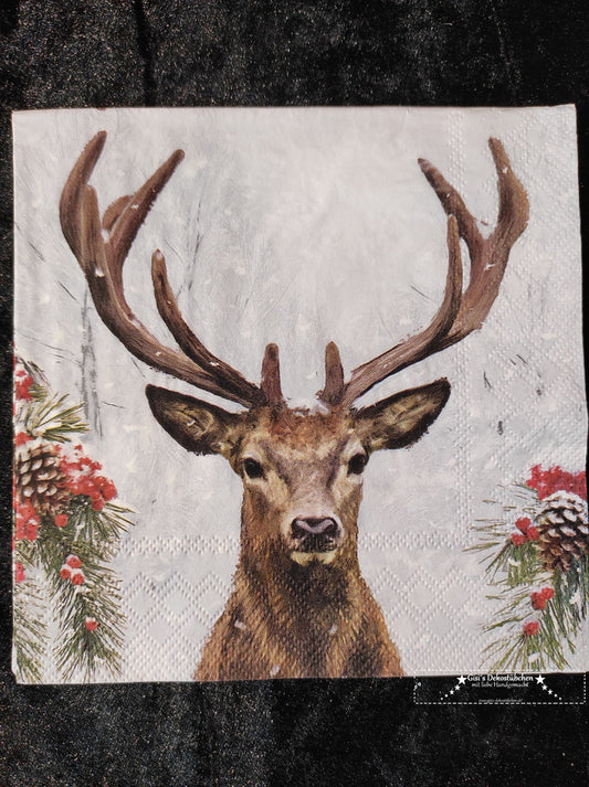 Hirsch im Schneefall