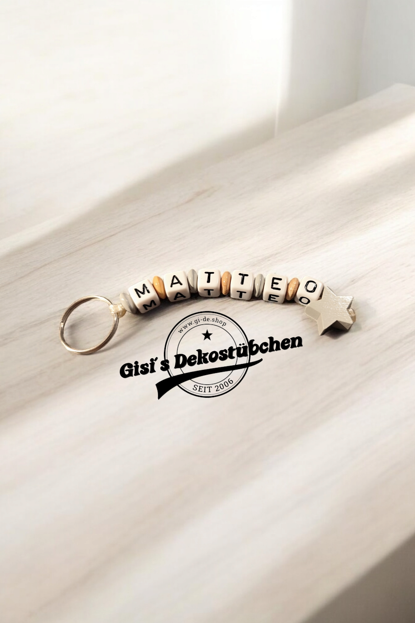 Schlüsselanhänger mit Namen Motiv Stern