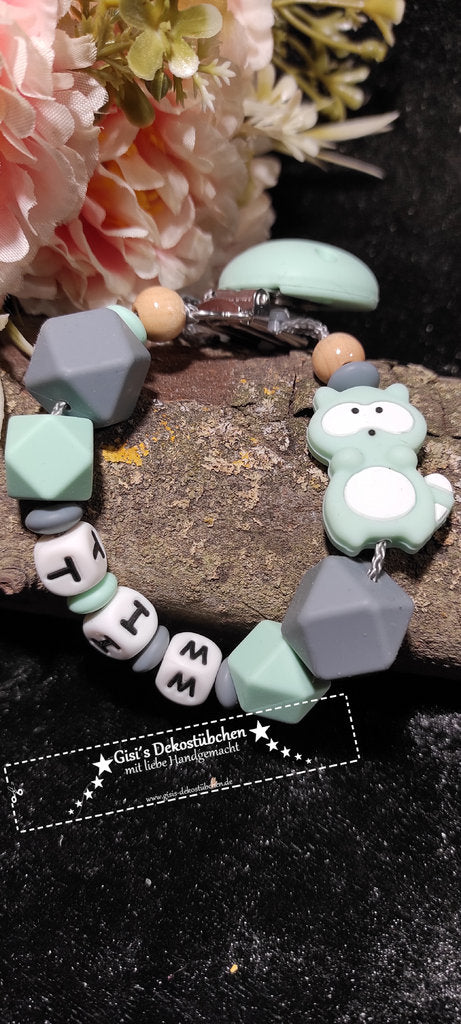 Schnullerkette Silikon Waschbär grau/mint
